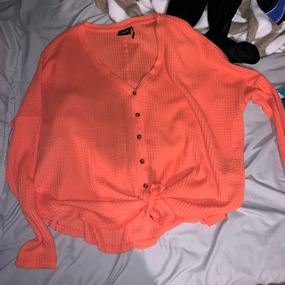 urban outfitters salmon-colored button up sweater